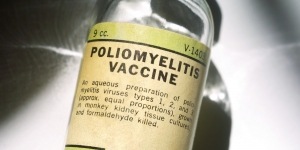 Bottle of poliomyelitis vaccine, close-up