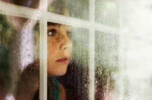 little-girl-looking-out-window