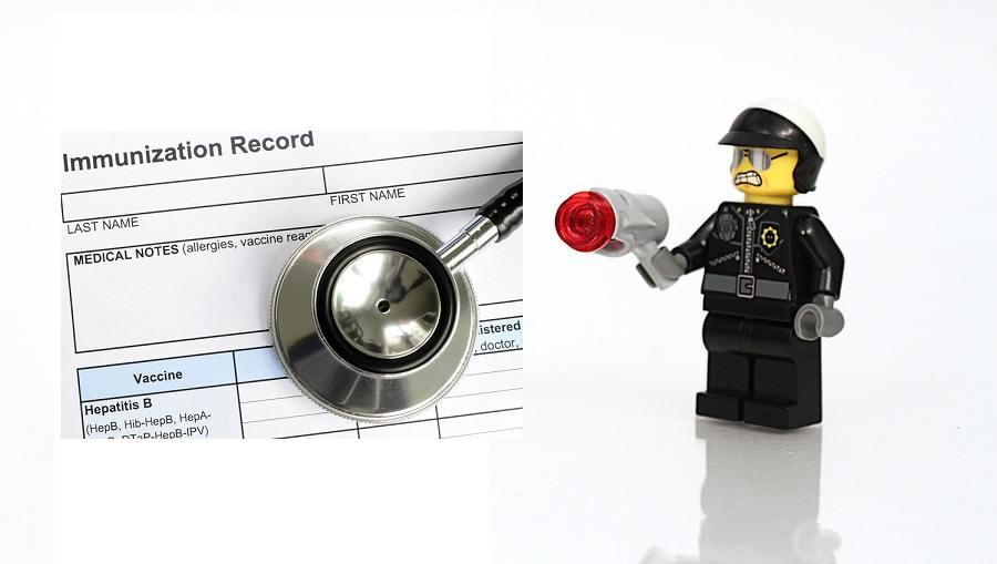 Studio shot of Lego cop with gun. 