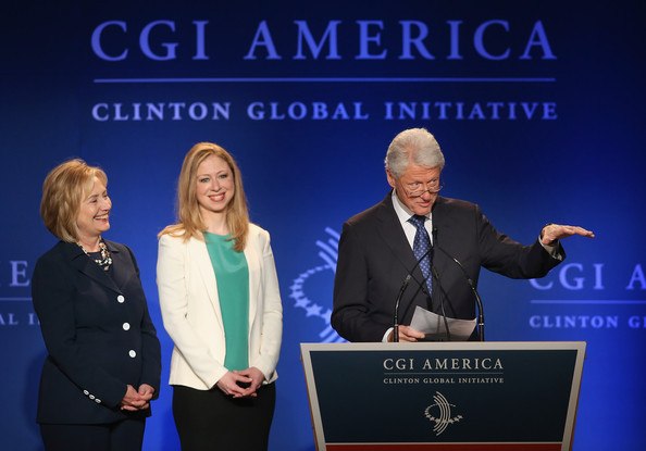 Clinton Global Initiative image with Bill, Hillary, and Chelsea