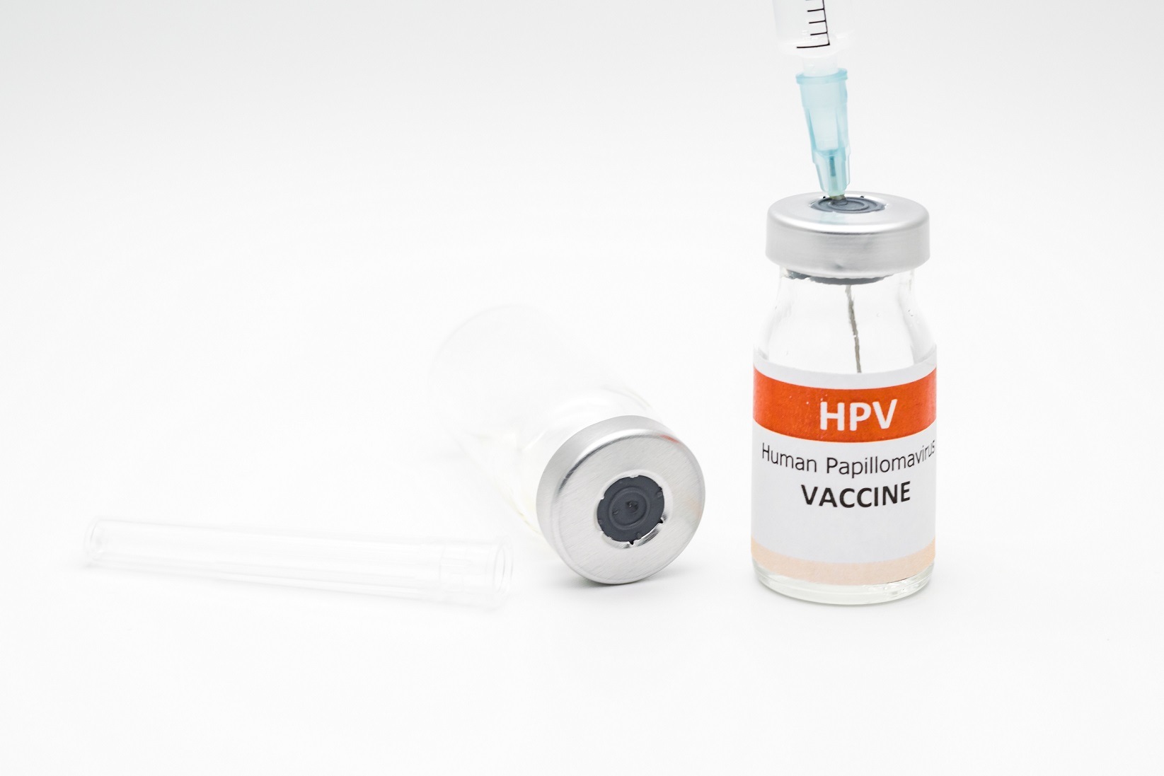 human papillomavirus ,HPV vaccine with needle on white background