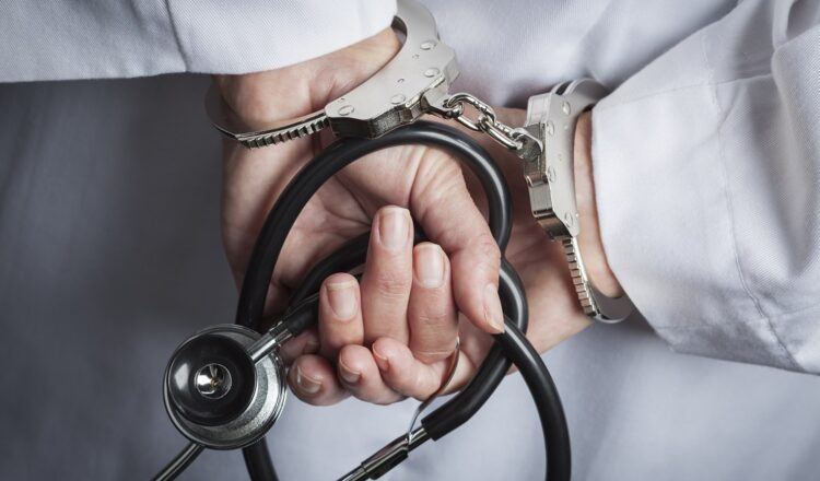 Federation of State Medical Boards Threatens Doctors Who Speak Out Against COVID-19 Vaccines Doctor-handcuffs-750x440-1