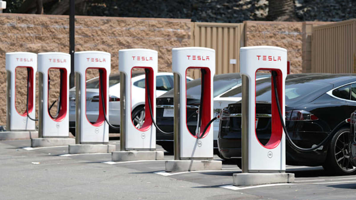 Are Tesla’s EV Competitors All Adopting Musk’s Charging Stations by Force so the Government Can Track All EVs? Tesla-charging-station