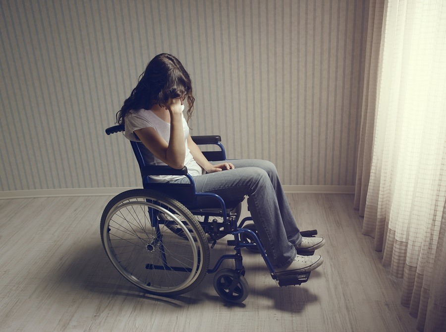 Crying-Woman-Sitting-In-Wheelchair