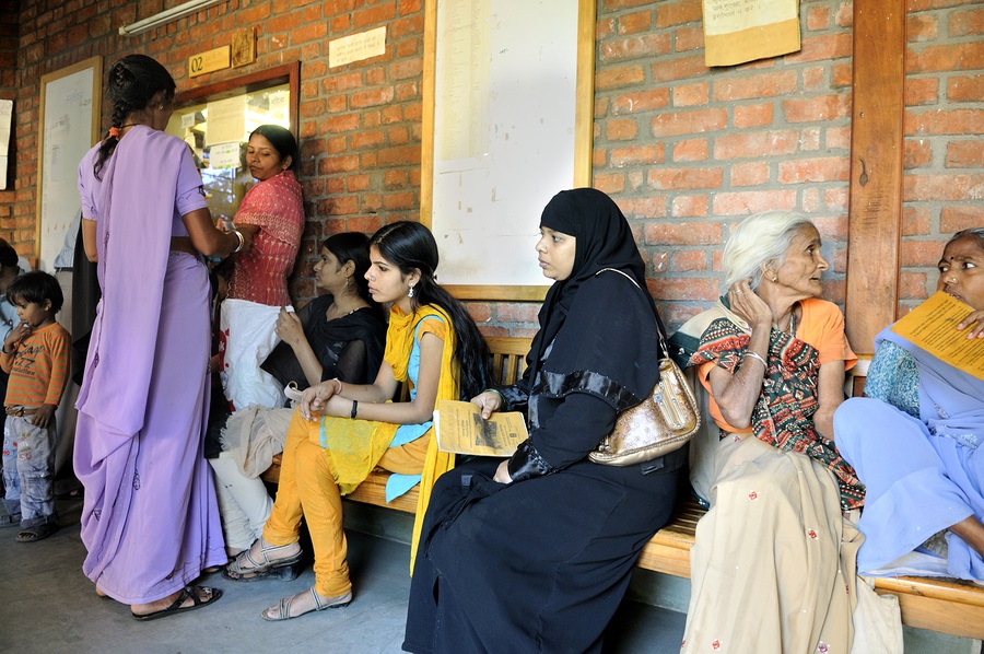 BHOPAL- DECEMBER 6: in Bhopal -Three generation of the Bhopal gas disaster survivors waiting in a corridor of a free clinic in India on December 6, 2010.